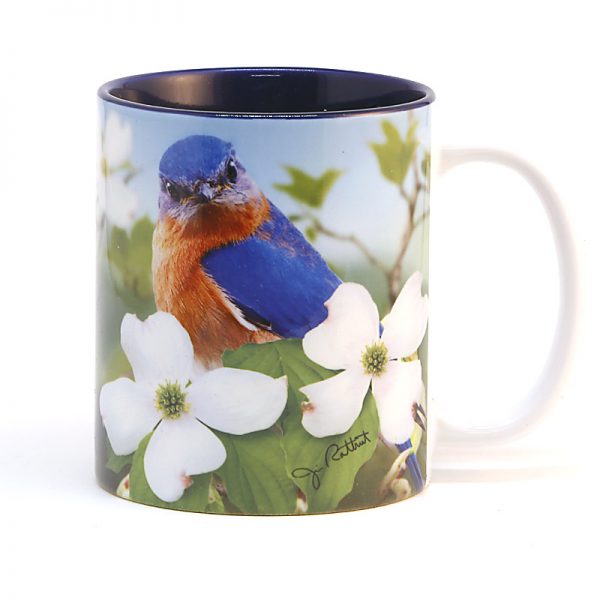Bluebirds with flowering dogwoods 15 oz mug blue interior