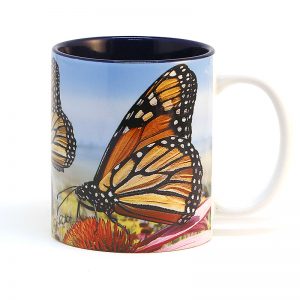 Monarch butterflies on coneflowers 15 oz mug blue interior